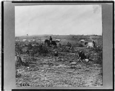 5759 - Fort Burnham, formerly Confederate Fort Harrison, James River, Virginia, with man on horseback and tents in background