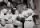 Leroy "Satchel" Paige shows grip to Mantle, Reynolds, Dimaggio