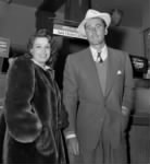 Thumbnail for Flynn and first wife Lili Damita at Los Angeles airport in 1941.