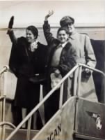 Photograph of Douglas MacArthur, his wife, and his son, returning to the Philippines in 1950 for a visit.