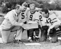 Thumbnail for 1938: Coach with his players