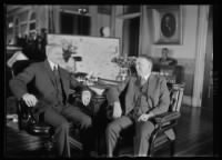 Thumbnail for Gen. John J. Pershing, Chief of Staff, at his desk in the War Dept. for the first time since his return from France, conferring with Major Cen. John L. Hines, Deputy Chief of Staff.jpg