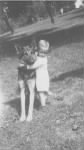 Thumbnail for Gene W. Mader, Hugging Pal, abt 1933.jpg