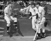 Joe Gordon (left), Lefty Gomez, and Joe DiMaggio.jpg