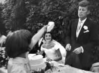 Thumbnail for wedding cake is offered bridegroom by flower girl Janet at the luncheon..jpg