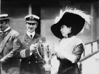 Margaret Brown (right) giving Captain Arthur Henry Rostron an award for his service in the rescue of Titanic's surviving passengers.jpg