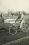 Thumbnail for Virgil D Kamp on bike on tracks.jpg