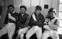 Thumbnail for Johnny Longden (second from right) with fellow jockeys, Laurel Park, Maryland, 1952..jpg