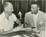 Thumbnail for Veeck Signs Larry Doby.jpg