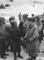 Walton Walker meets the commander of the 2nd French Armored Division General LeClerq.jpg