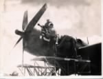 Thumbnail for Leonard Servat on top of plane WWII.jpg