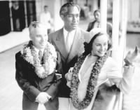 Duke Kahanamoku, with Charlie Chaplin and Chaplin's wife Paulette Goddard, 1938..jpg