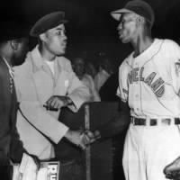 Thumbnail for satchel_paige-shakes-hands-with-boxing-great-joe-louis-in-chicago--1948_b492c91059.jpg