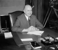 Stanley Forman Reed at desk.jpg