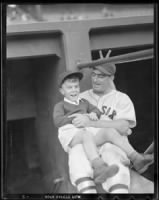 1938 - catcher Moe Berg with batboy Donald Davidson at Fenway Park.jpg