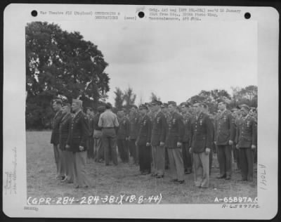 Awards > Colonel Harry Leber, Commanding Officer, Presented Medals To Men Of The 381St Bomb Group During A Ceremony On 18 August 1944 At 8Th Air Force Station 167, England.