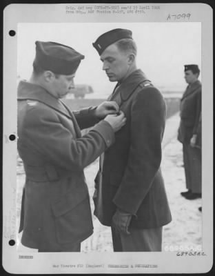 Thumbnail for Awards > Lt. Chase Of The 353Rd Fighter Group Is Presented The Air Medal By Colonel Rimerman Somewhere In England, 30 December 1944.