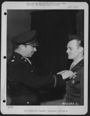 Thumbnail for Awards > Lt. Carb Of The 353Rd Fighter Group Is Presented The Air Medal By Lt. Colonel B. Rimerman On 29 August 1944 At An Airbase In England.