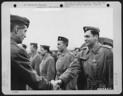 Thumbnail for Awards > Lt. Cohan Of The 490Th Bomb Group Is Awarded The Distinguished Flying Cross By Major General Earle E. Partridge At An 8Th Air Force Base In England.  12 February 1945.