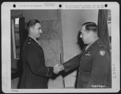 Awards > Colonel Gross, Attached To Hdq., 1St Bomb Division, Is Congratulated By Brig. General Robert B. Williams During A Ceremony At An 8Th Air Force Base In England On 5 June 1944.