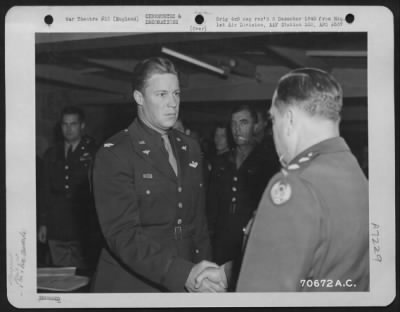 Thumbnail for Awards > Colonel Preston, Attached To Hdq., 1St Bomb Division, Is Congratulated By Brig. General Robert B. Williams During A Ceremony At An 8Th Air Force Base In England On 5 June 1944.