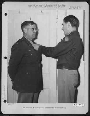 Thumbnail for Awards > Lt. Col Brown, Attached To Hdq., 1St Bomb Division, Receives An Award From Brig. General Bartlett Beaman During A Ceremony On 19 June 1945 At An 8Th Air Force Base In England.