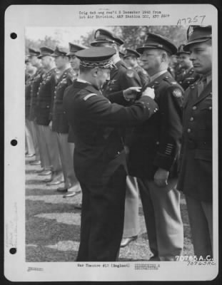 Thumbnail for Awards > Colonel Slagle Is Presented The Croix De Guerre By A French Officer During A Ceremony At The Headquarters Of 1St Bomb Division In England.  4 June 1945.