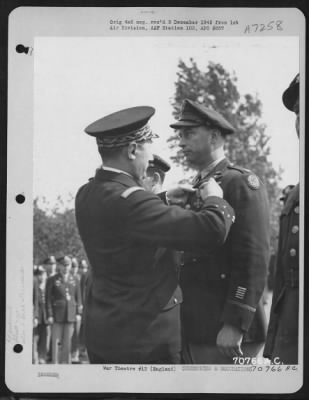 Awards > Colonel Marion Is Presented The Croix De Guerre By A French Officer During A Ceremony At The Headquarters Of 1St Bomb Division In England.  4 June 1945.