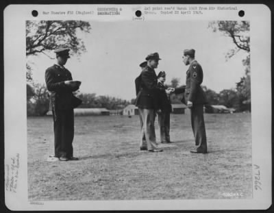 Thumbnail for Awards > Colonel Edward J. Timberlake Congratulates S/Sgt. Lloyd E. Adelsberger Of The 93Rd Bomb Group After Presenting Him With An Award During A Ceremony At An 8Th Air Force Base In England.  Sgt. Adelsberger Hails From North Little Rock, Arkansas.