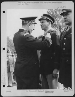 Awards > Colonel Lyle Of The 379Th Bomb Group Is Decorated By A French Officer During A Colorful Ceremony At An 8Th Air Force Base In England.  6 May 1945.