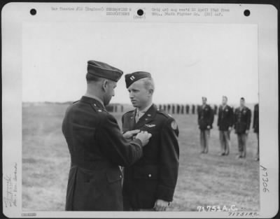 Thumbnail for Awards > Captain Stevenson Of The 339Th Fighter Group Is Presented An Award By Brig. General Murray C. Woodbury At An 8Th Air Force Station F-378 In England.  22 July 1944.