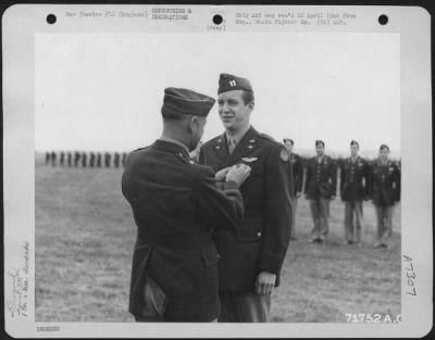 Thumbnail for Awards > Captain Bryan Of The 339Th Fighter Group Is Presented An Award By Brig. General Murray C. Woodbury At An 8Th Air Force Station F-378 In England.  22 July 1944.