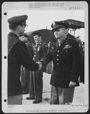 Awards > Colonel Moller Of The 390Th Bomb Group Is Congratulated After Receiving An Award During A Ceremony Somewhere In England.  13 October 1944.