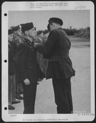 Thumbnail for Awards > Lt. Banne Of The 569Th Bomb Squadron, 390Th Bomb Group Receives An Award During A Ceremony At An Air Base Somewhere In England.  29 August 1944.