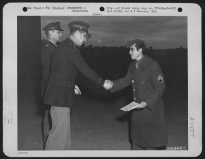 Awards > Colonel John H. Hayden, Tampa, Fla., Presents The Air Medal To S/Sgt. John W. Husselton, Fairfield, Illinois Of The 844Th Bomber Squadron, Norwich, England.  3 March 1943.