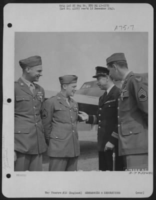 Thumbnail for Awards > Colonel Ed Corniglion-Moliner Congratulates S/Sgt. John E. Breen, Waist Gunner From Chicago, Illinois, After The Latter Was Presented The Silver Star During A Ceremony At Chelveston, England On 25 July 1943.  The Men Are, Left To Right: T/Sgt. Fred J. Bew