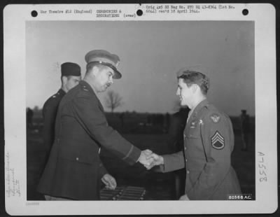 Awards > Colonel John H. Hayden Congratulates S/Sgt. William F. Doerner Of Cleveland Ohio, A Member Of The 328Th Bomb Squadron, 93Rd Bomb Group, After Presenting Him The Distinguished Flying Cross During A Ceremony At Hardwick, England.  11 November 1943.