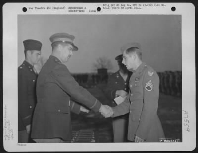 Awards > Colonel John H. Hayden Congratulates S/Sgt. Albert H. Oser Of Boston, Mass., A Member Of The 328Th Bomb Squadron, 93Rd Bomb Group, After Presenting Him The Distinguished Flying Cross During A Ceremony At Hardwick, England.  11 November 1943.