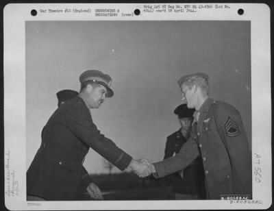 Awards > Colonel John H. Hayden Congratulates T/Sgt. Prince A. Martin Of Calera, Ala., A Member Of The 328Th Bomb Squadron, 93Rd Bomb Group, After Presenting Him The Distinguished Flying Cross During A Ceremony At Hardwick, England.  11 November 1943.