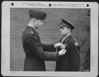 Thumbnail for Awards > Lt. Boehner Of The 753Rd Bomb Squadron, 458Th Bomb Group, Is Presented The Distinguished Flying Cross During A Ceremony At An Air Base Somewhere In England.  12 December 1944.