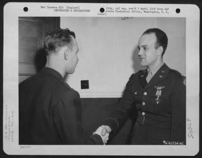 Awards > 1St Lt. Robinson Of The 752Nd Bomb Squadron, 458Th Bomb Group, Is Congratulated After Receiving The Distinguished Flying Cross During A Ceremony At An Air Base Somewhere In England.  11 March 1944.