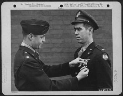 Thumbnail for Awards > 1St Lt. Mccarthy Of The 755Th Bomb Squadron, 458Th Bomb Group Is Presented The Distinguished Flying Cross During A Ceremony At An Air Base Somewhere In England.  14 December 1944.