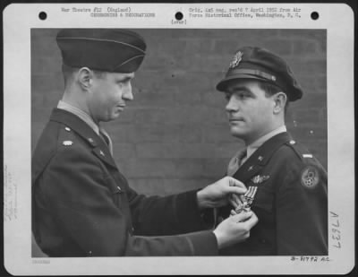 Thumbnail for Awards > 1St Lt. Mercer Of The 755Th Bomb Squadron, 458Th Bomb Group Is Presented The Distinguished Flying Cross During A Ceremony At An Air Base Somewhere In England.  14 December 1944.