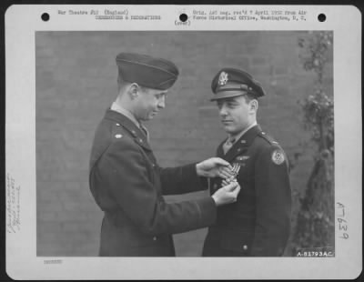 Thumbnail for Awards > 2Nd Lt. Huff Of The 755Th Bomb Squadron, 458Th Bomb Group Is Presented The Distinguished Flying Cross During A Ceremony At An Air Base Somewhere In England.  14 December 1944.