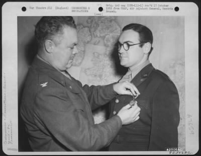 Awards > Colonel Jones, 9Th Troop Carrier Command Presents The Air Medal To Capt. Wm. Graffis At An Air Base Somewhere In England.  20 December 1944.