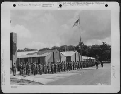 Thumbnail for Dedications > Men Of The 389Th Bomb Group Stand At Attention During A Ceremony Transferring An Raf Base In England To The Usaf On 23 August 1943.