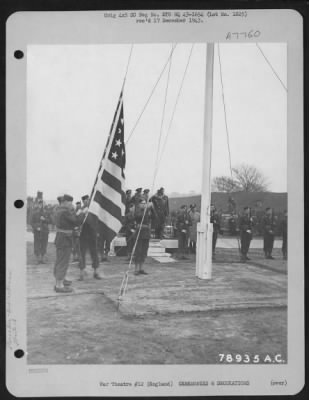 Thumbnail for Dedications > The American Flag Is Raised During A Ceremony Tranferring A British Airfield To The 8Th Air Force Service Command In Bushey Park, Teddington, England.  22 February 1943.