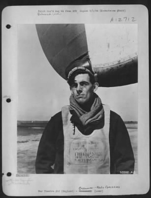 Radio Operator > ENGLAND-T/Sgt. Nelson P. Keefer, Wheeling, W. Va., radio operator on a B-24 Liberator, is pictured after landing from a mission over enemy territory.