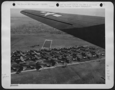 Thumbnail for General > INVASION PREPARATION somewhere in England during training for the ofrth-coming invasion. A column of fours-Douglas C-47's and gliders. The Douglas C-47's are in the two outside rows while the gliders are poised in the two center rows.