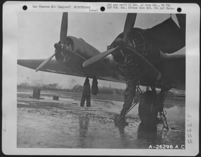 Thumbnail for General > "Hit Parade" got hit. This Flying ofrtress of the 8th AAF Bomber Command had completed five missions and had come through unscathed, but on the sixth it suffered battle damage. Pvt. Ray W. Bartles, 22, of 456 Broad St., Hartofrd, Conn., pulls the